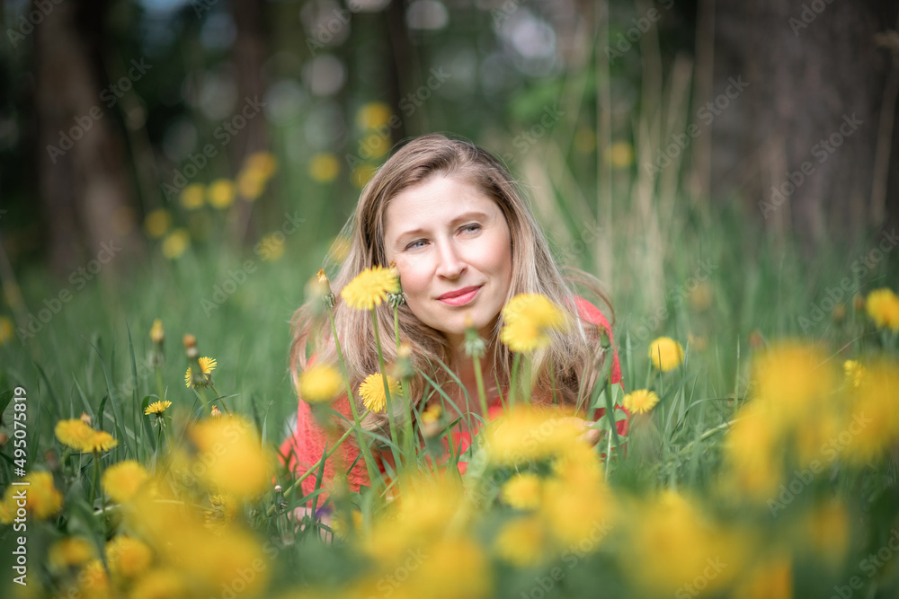 Portrait of a beautiful blonde girl in a summer field. Portrait of a beautiful blonde girl in a summer field.