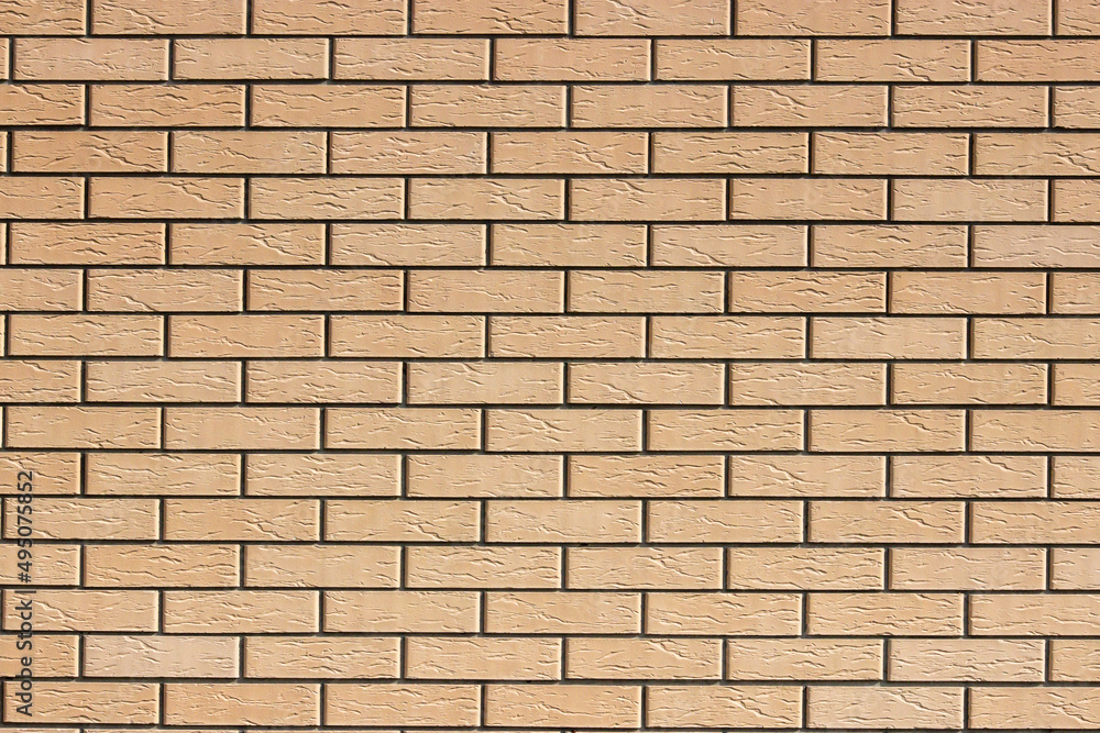 Obraz premium Yellow brick wall texture.
