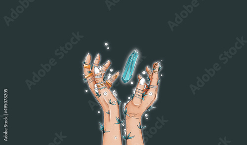 Female witch mystical hands with tatooes, rings, herbs and plants. Female magical hands with white spirits and white fireflights. Spellings, voodoo and magical rituals concept