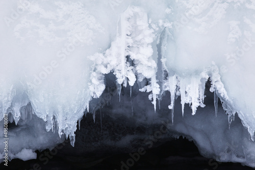 Frozen splash water on Baikal lake. Abstract winter background. Amazing scenery with frozen water