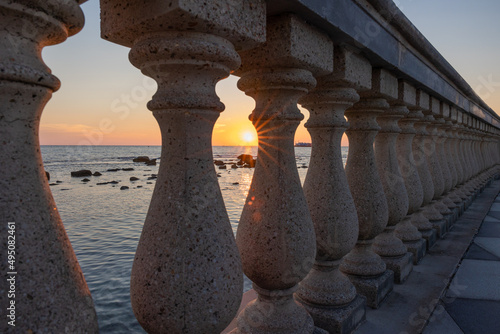 Beautiful sunset view from Mascagni terrace in a sunny day. Livorno, Tuscany, Italy