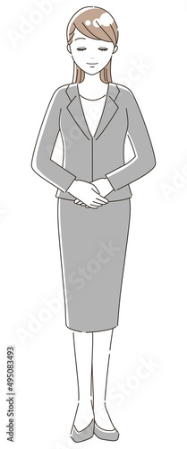 お辞儀をして挨拶をするスーツを着た女性（全身）1