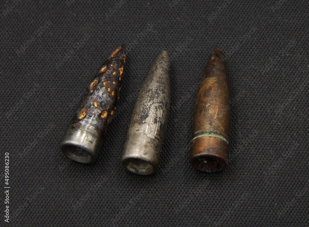 Old rifle bullets on black background Old rifle bullets on black background