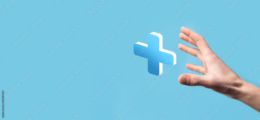Obraz premium Businessman hold 3D plus icon, man hold in hand offer positive thing such as profit, benefits, development, CSR represented by plus sign.The hand shows the plus sign