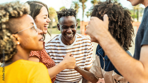 Photography Multiracial best friends having fun laughing out loud outdoors - Group of young