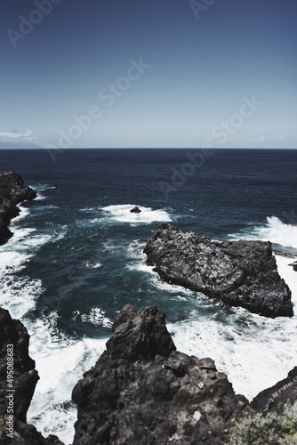 waves crashing on rocks