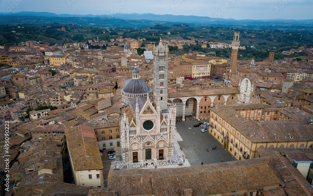 Architecture of medieval Siena town and cathedral from above. Aerial drone photo, Siena, Tuscany, Italy