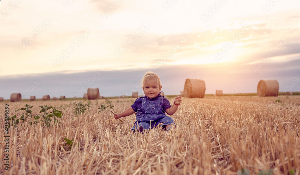 happy baby girl on field of wheat happy baby girl on field of wheat