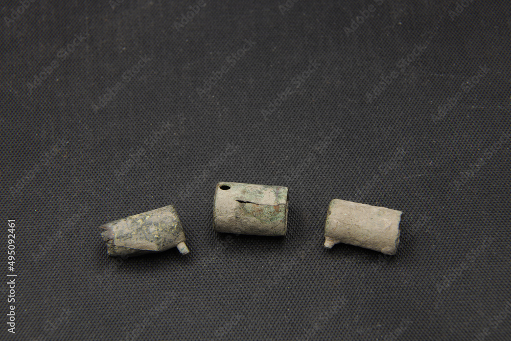 Antique used revolver cartridges on black background Antique used revolver cartridges on black background