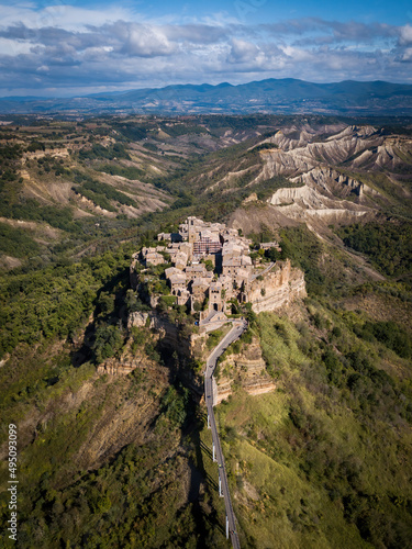 Small historical town Civita di Bagnoregio from above. Aerial drone photo, Montepulciano, Italy