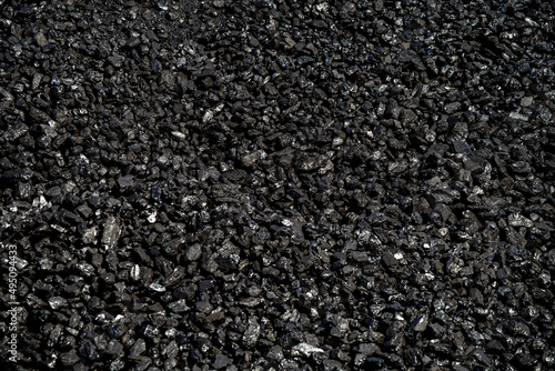 Fototapet full frame close-up of Heap of black coal stored at a narrow gauge train station