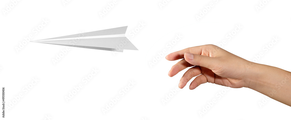 Fotografie Hand throwing paper plane isolated on white background