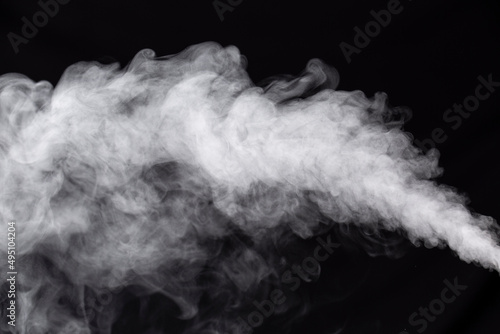 黒背景で撮影された加湿器の水蒸気 photo