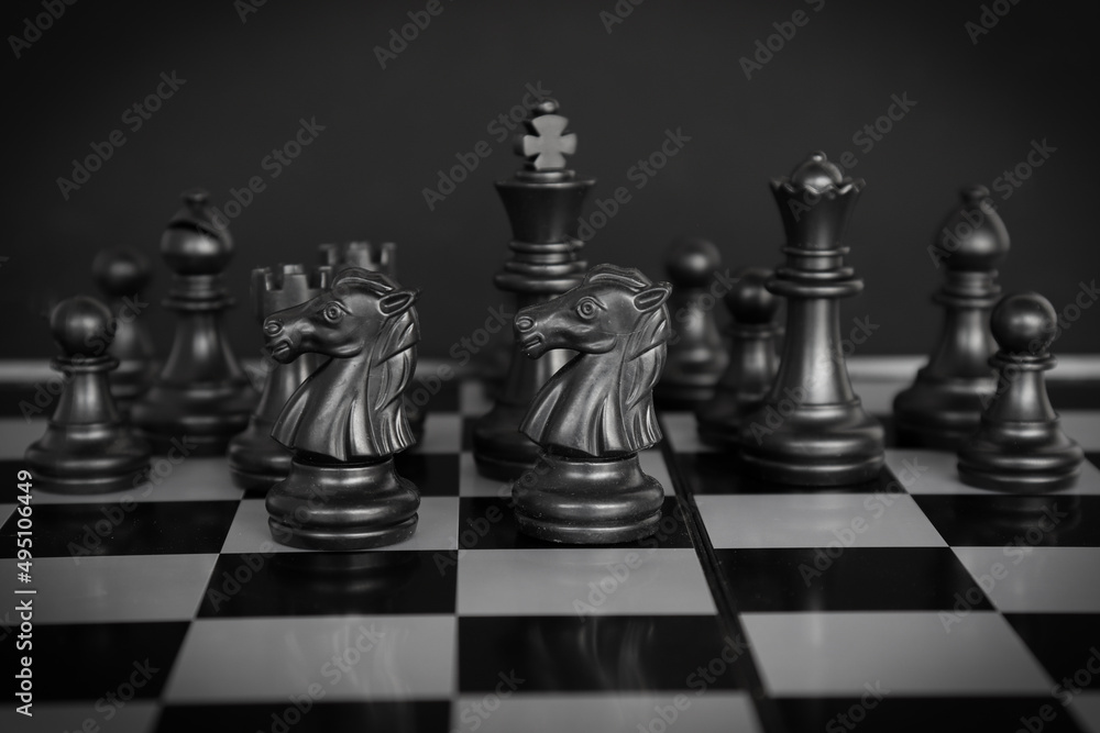 Obraz premium concept chess board game black. planning and decision making business leader concept. Selective focus.
