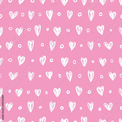 Seamless pattern with small hearts on a pink background.