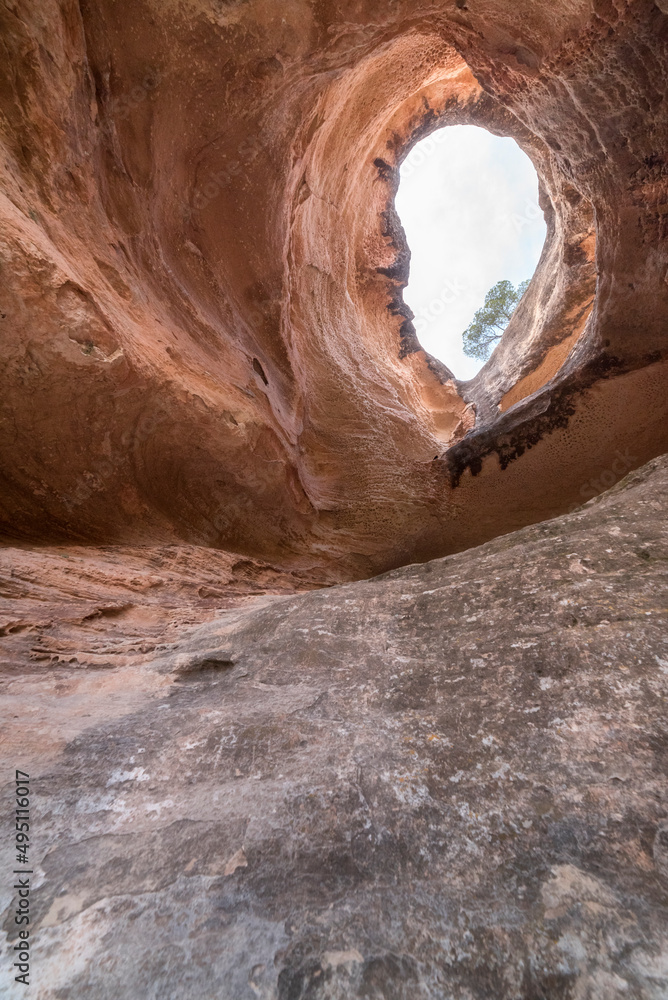 Naklejka premium Orange stone cave. Hollow cave. The great cave. 
