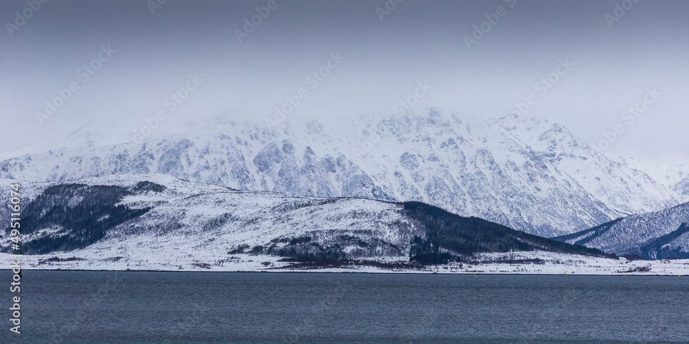 Snowy seascape at Vesteralen Islands in Norway.