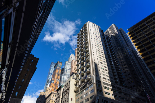 Newly built ultra luxury high-rise residential buildings stand among Midtown Manhattan skyscraper on November 03, 2021 in New York City NY USA.