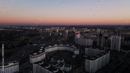 City block. Modern multi-storey buildings. Flying at dusk at sunset. Aerial photography. © f2014vad