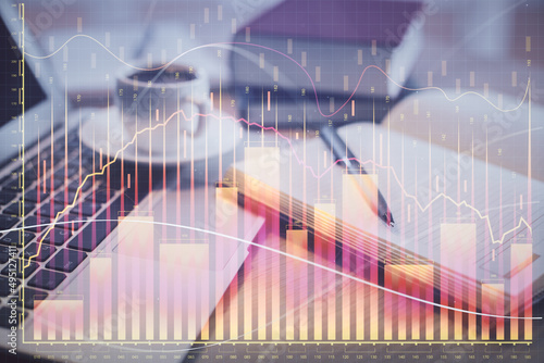 Wallpaper Mural Double exposure of forex chart drawing and desktop with coffee and items on table background. Concept of financial market trading Torontodigital.ca