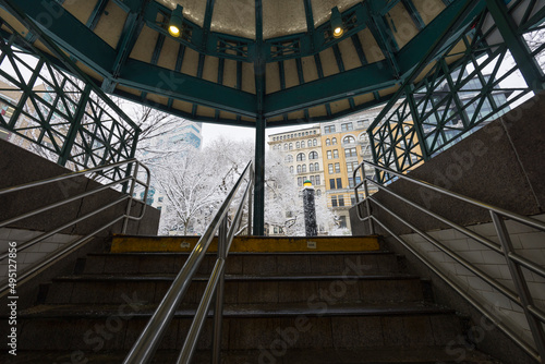 Entrances of Union Square subway station at morning commute during winter snowstorm on January 07, 2022in New York City NY USA.
