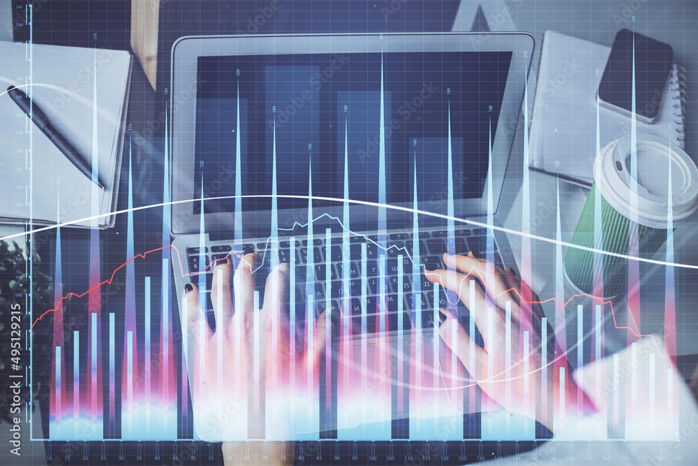 Double exposure of woman hands typing on computer and forex chart hologram drawing. Stock market invest concept. Double exposure of woman hands typing on computer and forex chart hologram drawing. Stock market invest concept.