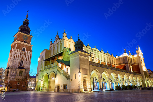 Cloth Hall and Town Hall Tower on the Main Market Square at dusk in Krakow, Poland
