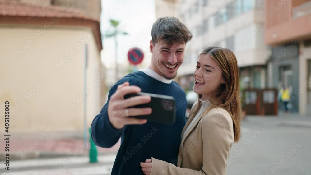 Young couple smiling confident having video call at street Young couple smiling confident having video call at street
