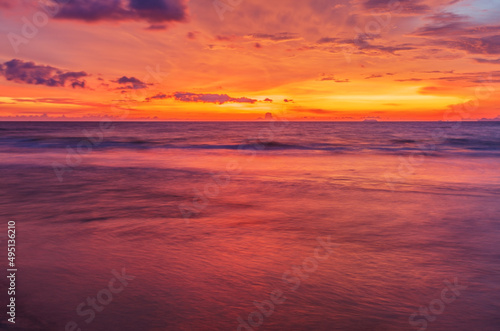 Sunset ebb on sunset background © Kushch Dmitry