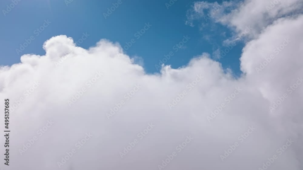 Cinematic breathtaking aerial flying backwards through white clouds in heavens Cinematic breathtaking aerial flying backwards through white clouds in heavens