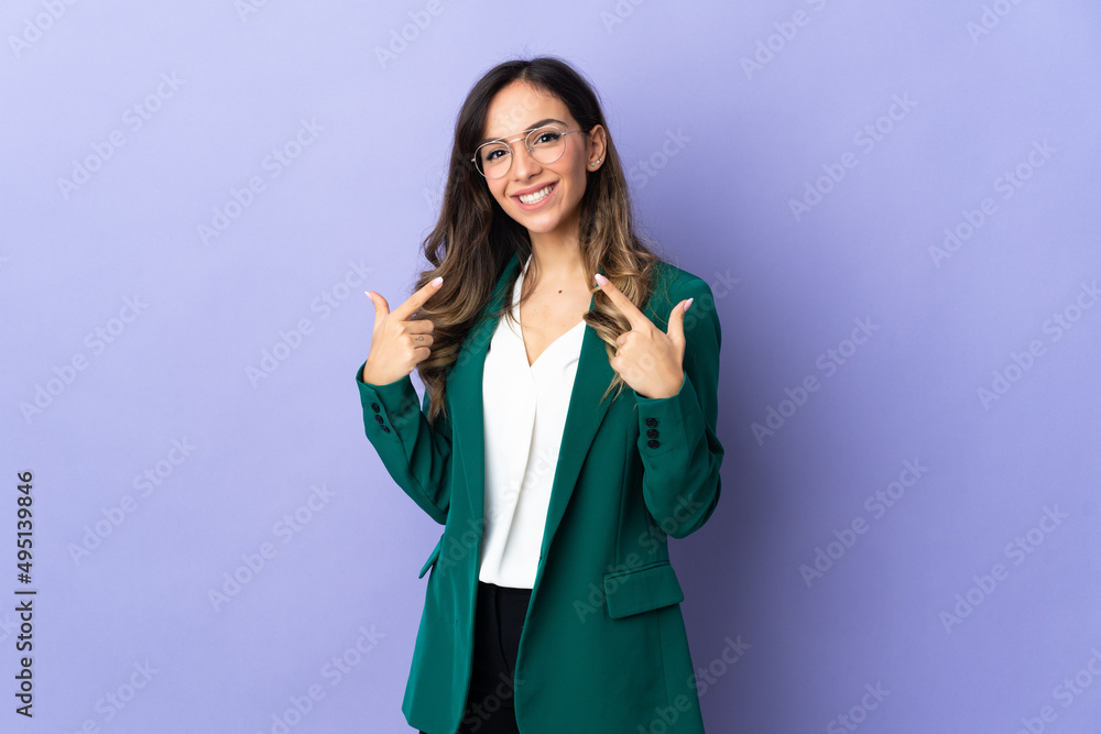 Young caucasian woman isolated on purple background giving a thumbs up gesture Young caucasian woman isolated on purple background giving a thumbs up gesture