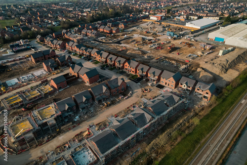 Aerial View Houses Residential British England Drone Above View Summer Blue Sky Estate Agent. photo