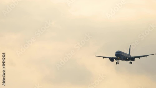 Wallpaper Mural Airplane in the twilight sky Torontodigital.ca