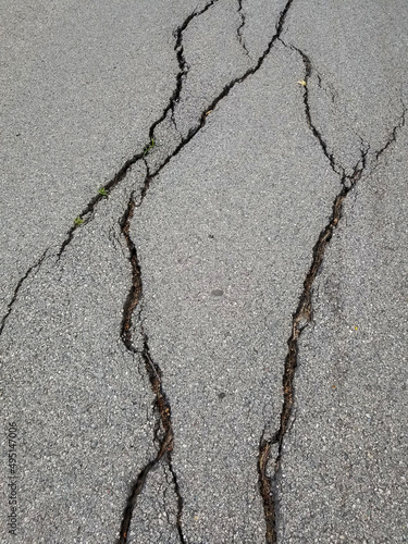 Cracked asphalt. asphalt texture with cracks