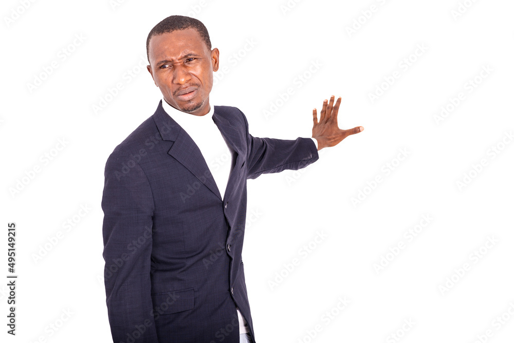 young angry businessman showing stop gesture. young angry businessman showing stop gesture.
