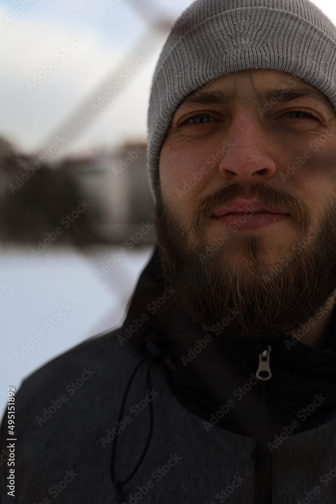 selective focus, a man with beard in winter outdoors selective focus, a man with beard in winter outdoors