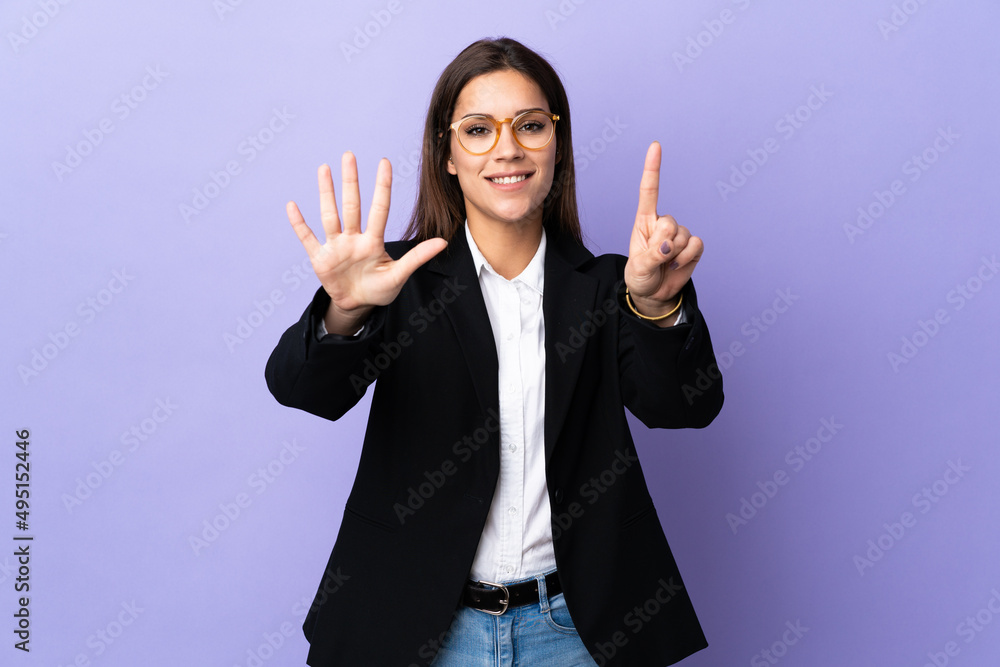 Business woman isolated on purple background counting six with fingers Business woman isolated on purple background counting six with fingers