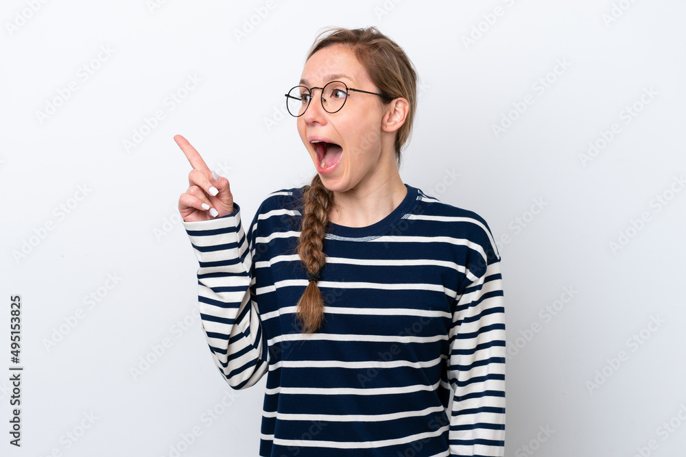 Young caucasian woman isolated on white background intending to realizes the solution while lifting a finger up Young caucasian woman isolated on white background intending to realizes the solution while lifting a finger up