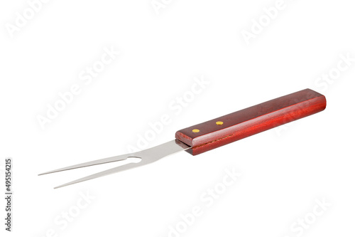 Barbecue fork isolated on white background. Stainless steel grill fork with wooden handle. Close up.