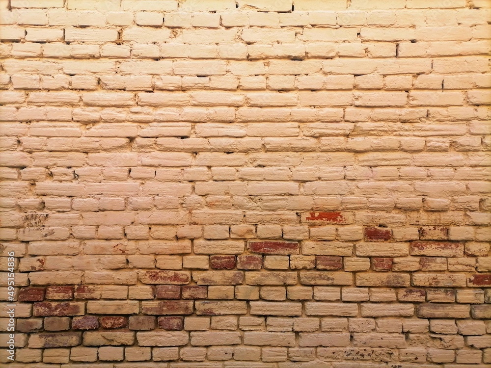 Obraz premium Yellow brick wall