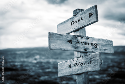 best average worst text quote written in wooden signpost outdoors in nature. Moody theme feeling.