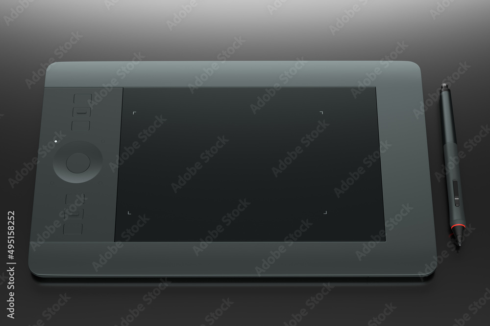 Graphic tablet and pen for illustrators, designers and photographers on black Graphic tablet and pen for illustrators, designers and photographers on black
