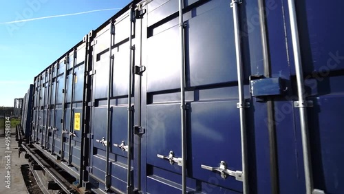 blue train freight train wagons. business logistics concepts, import and export concepts.