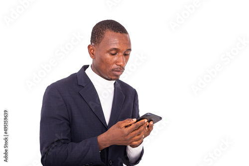 close-up of a handsome businessman looking at cellphone.