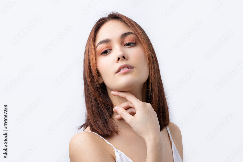 Beautiful smiling woman with clean skin, natural make-up and white teeth on a gray background Beautiful smiling woman with clean skin, natural make-up and white teeth on a gray background