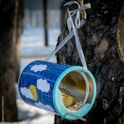 Do-it-yourself feeder in the winter forest