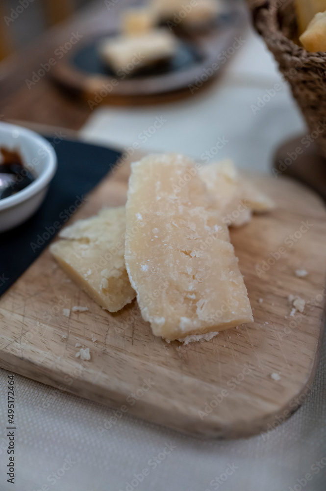 Tasting of different matured and old parmesan Parmigiano-Reggiano hard cheese in Parma, Emilia Romagna, Italy