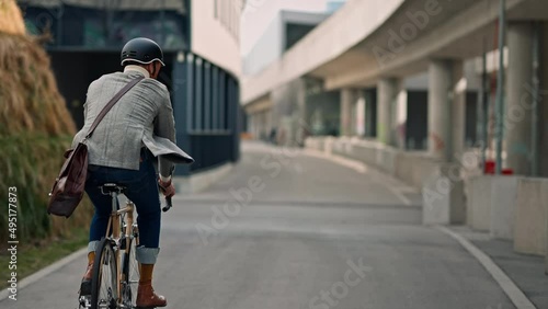 Businessman going to work on bike. Eco friendly transport