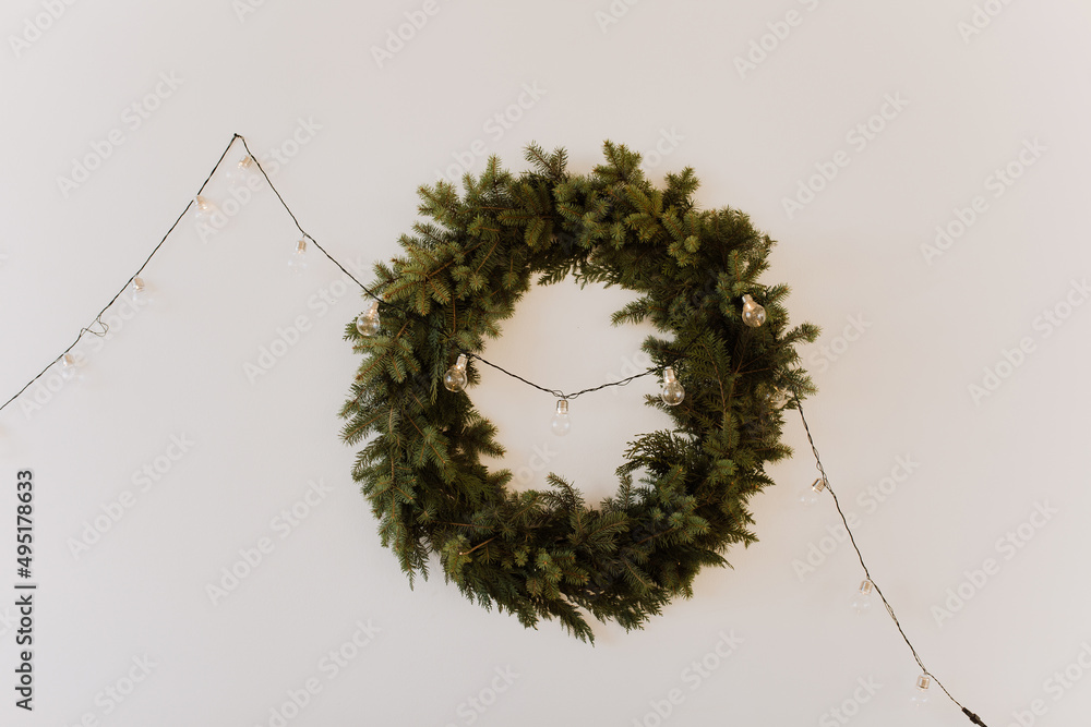 New Year's wreath in the interior. Festive mood New Year's wreath in the interior. Festive mood