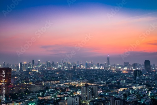 Twilight cityscape of modern capital Bangkok city, Thailand in evening. Building, architecture and city concept.